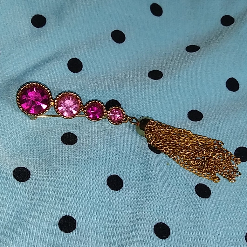 Sarah Coventry gold tone w/ pink stones & tassel
